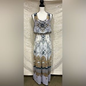 Full length Boho lightweight dress with Metal detailing on the chest!
